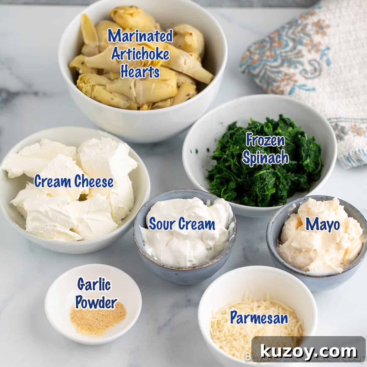 Creamy Spinach and Artichoke Dip Recipe for Entertaining 3 Ingredients for making an artichoke dip.