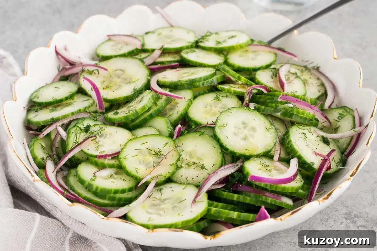Refreshing Cucumber Salad with Dill and Lemon Vinaigrette 3 best cucumber salad in a white bowl