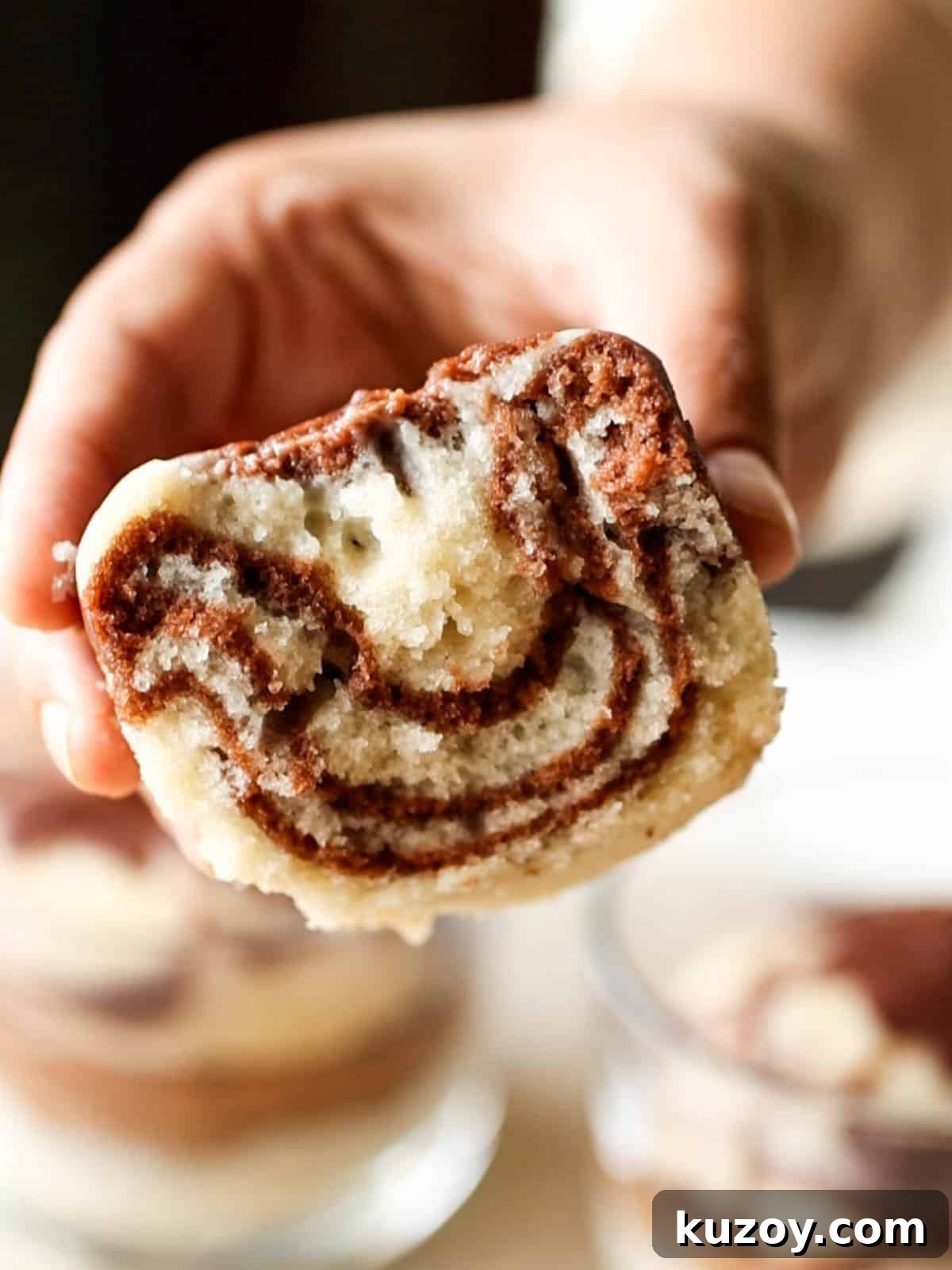 Fluffy Eggless Marble Cake Without Oven or Microwave 3 mini eggless marble cake cut open to show the swirls