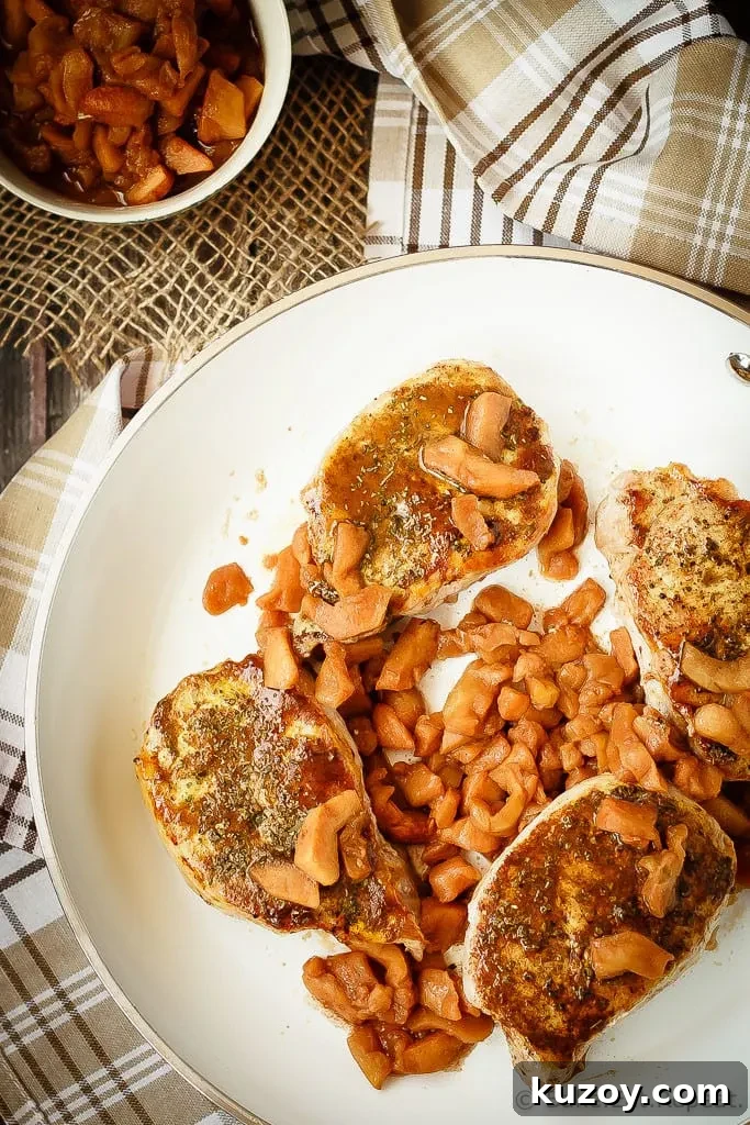 Cinnamon-Glazed Baked Pork Chops with Maple Butter Finish 2 Baked Pork Chops with a Cinnamon Glaze - These baked pork chops with a cinnamon glaze are a simple, 30 minute meal that your whole family will love. Served with baked cinnamon apples and so tasty!