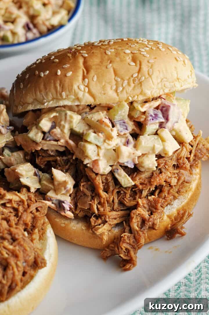 Crisp Green Apple Coleslaw with Tangy Dijon Dressing 9 Apple slaw on top of pulled pork on bun
