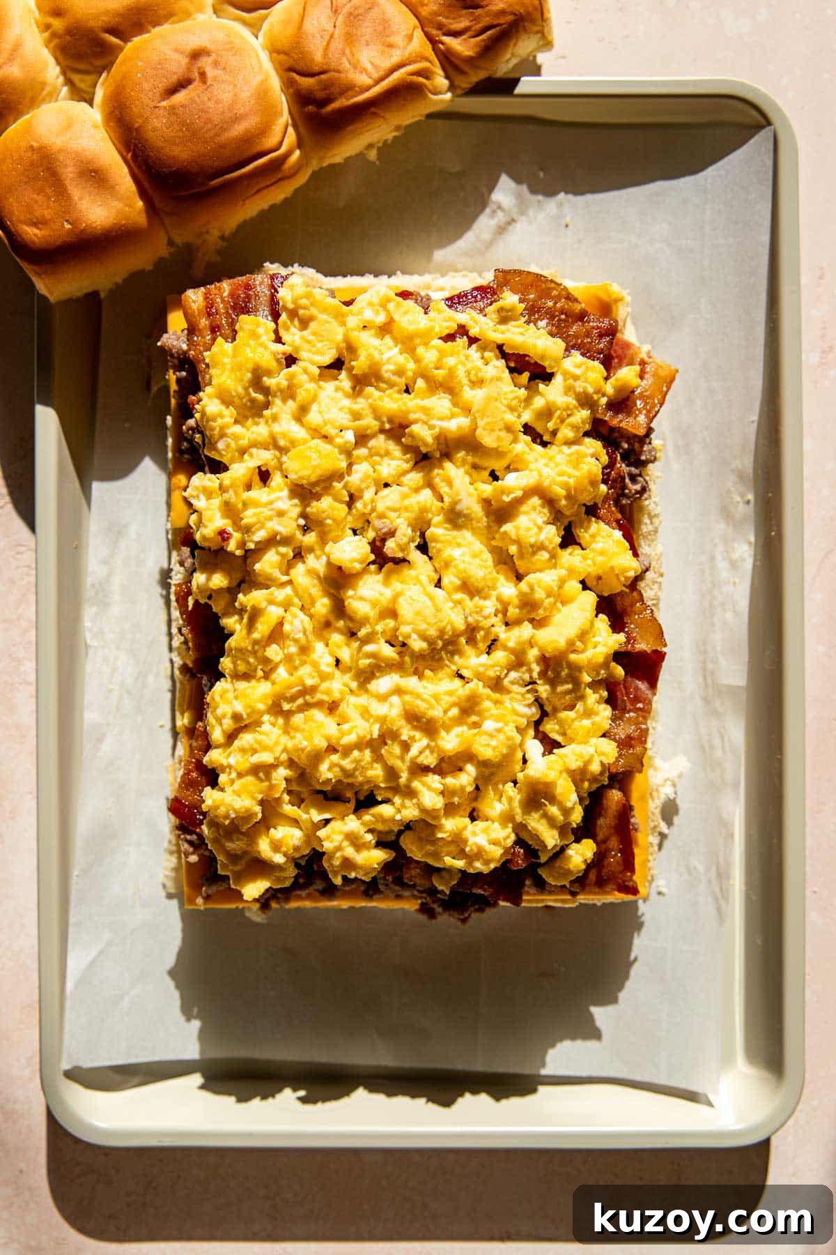 scrambled eggs and bacon on hawaiian rolls to make breakfast sliders. 