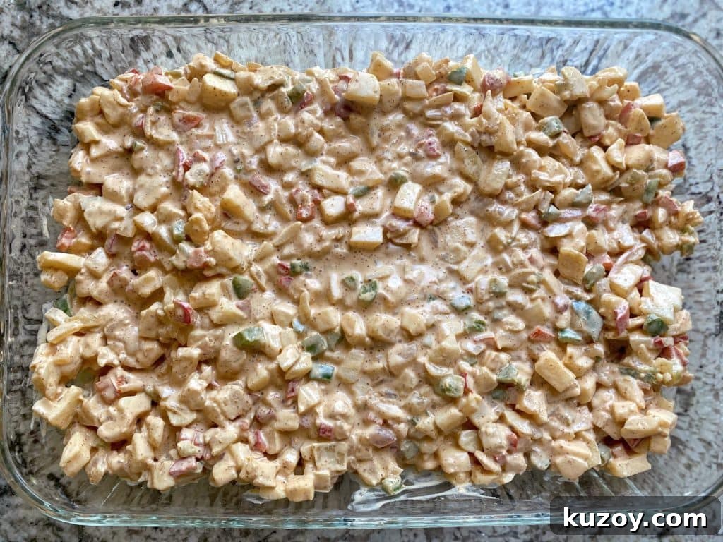 Creamy Vegan Hash Brown Casserole Recipe for Brunch or Dinner 7 Vegan hashbrown cassrole in a pan