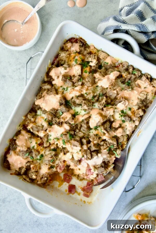 Reuben Casserole in white rectangular baking dish on cooling rack.