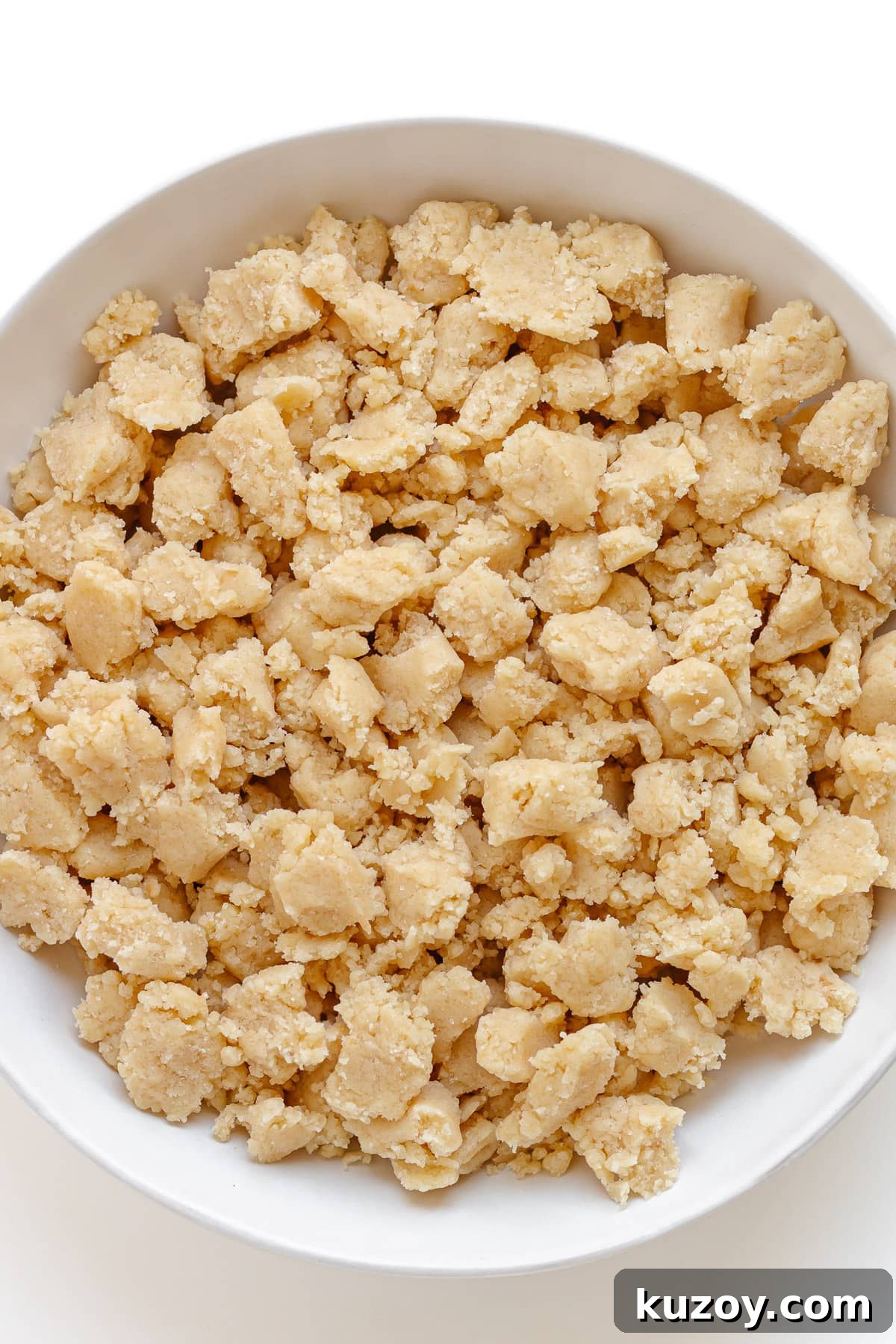 Unbaked German butter streusel topping in a white bowl.