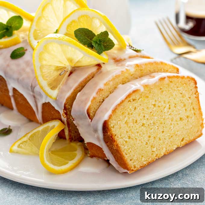 14 Romantic Valentine’s Day Recipes to Make at Home 12 Lemon loaf drizzled with lemon glaze on a white plate