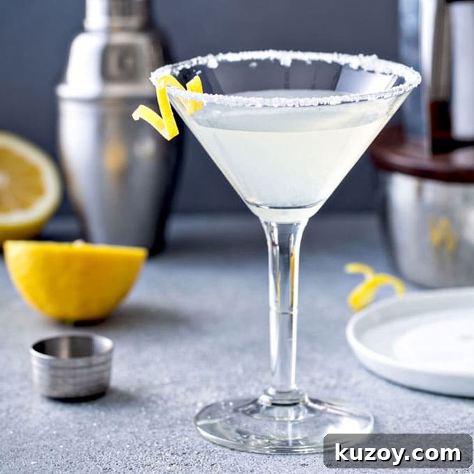 14 Romantic Valentine’s Day Recipes to Make at Home 14 A glass of lemon drop martini cocktail with sugar on the martini glass and a lemon twist