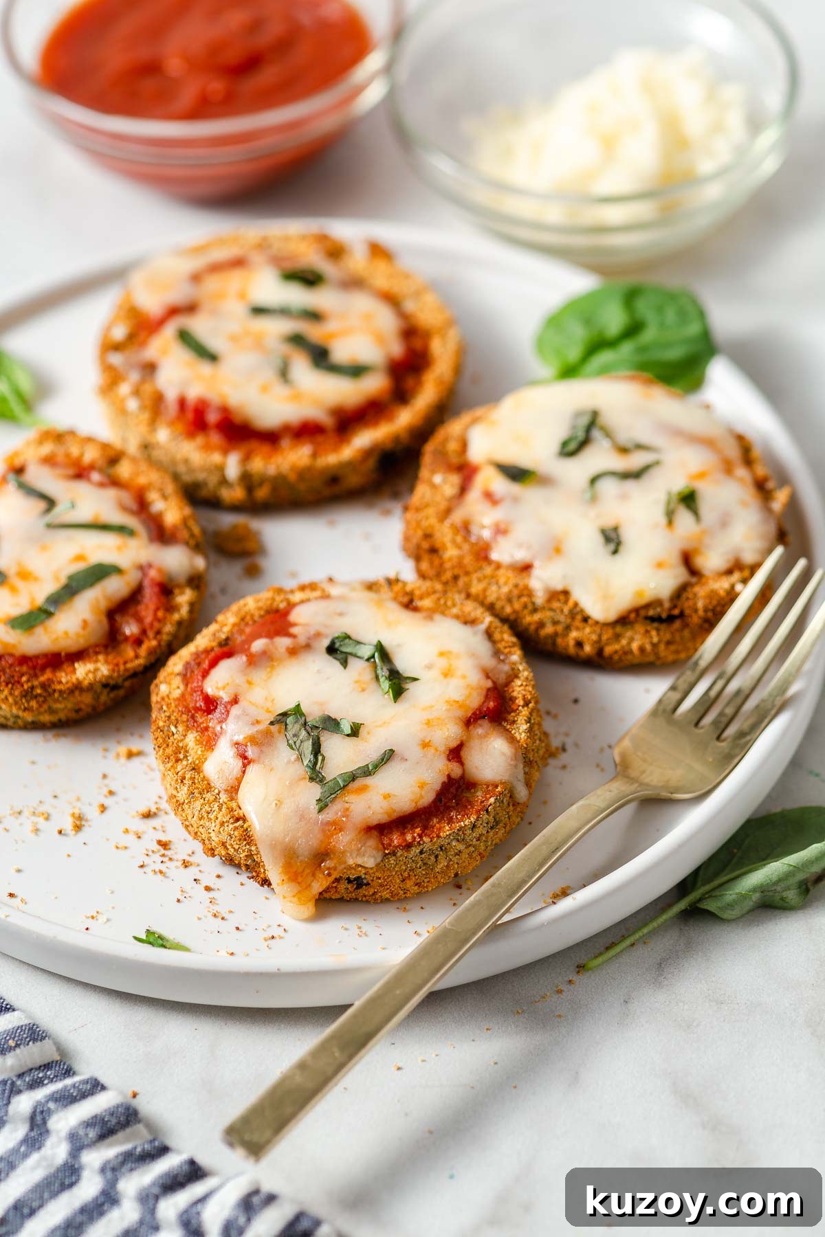 Crispy Air Fryer Eggplant Parmesan Recipe 13 crispy air fryer eggplant parmesan on a plate.