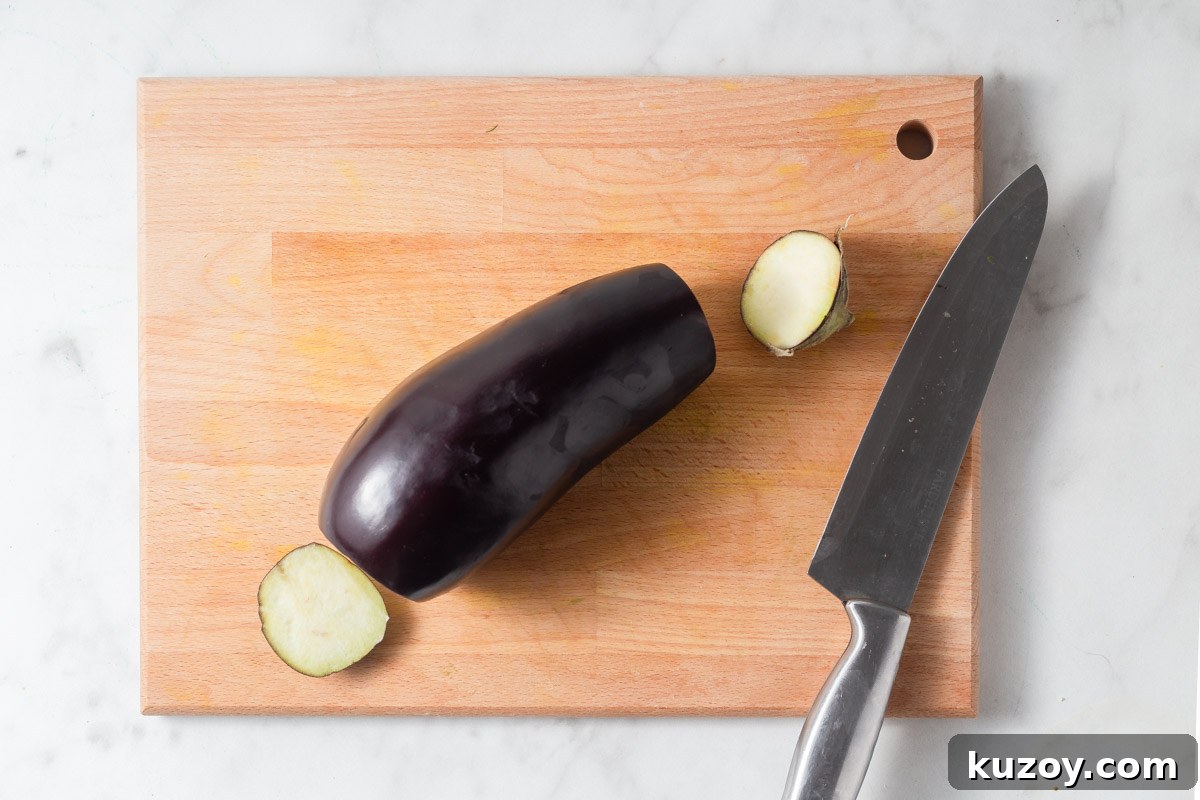 Crispy Air Fryer Eggplant Parmesan Recipe 4 cutting the ends off of eggplant.