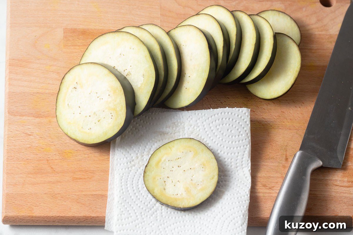 Crispy Air Fryer Eggplant Parmesan Recipe 5 sliced eggplants patted dry with paper towels.
