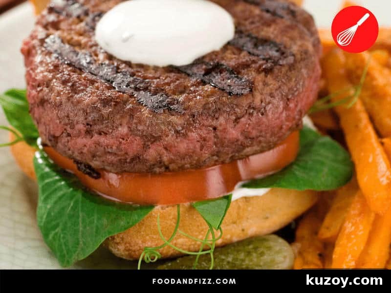 Is a Pink Center in Burgers Safe to Eat? Expert Answer 6 It is safe to eat a burger that's pink in the center as long as it is properly cooked.