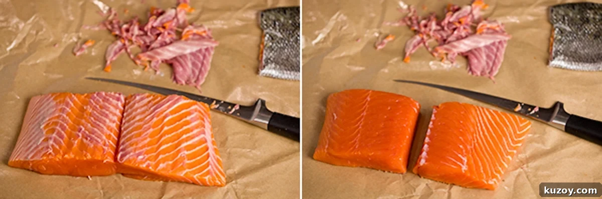Trimming salmon filets into portions with a filet knife.