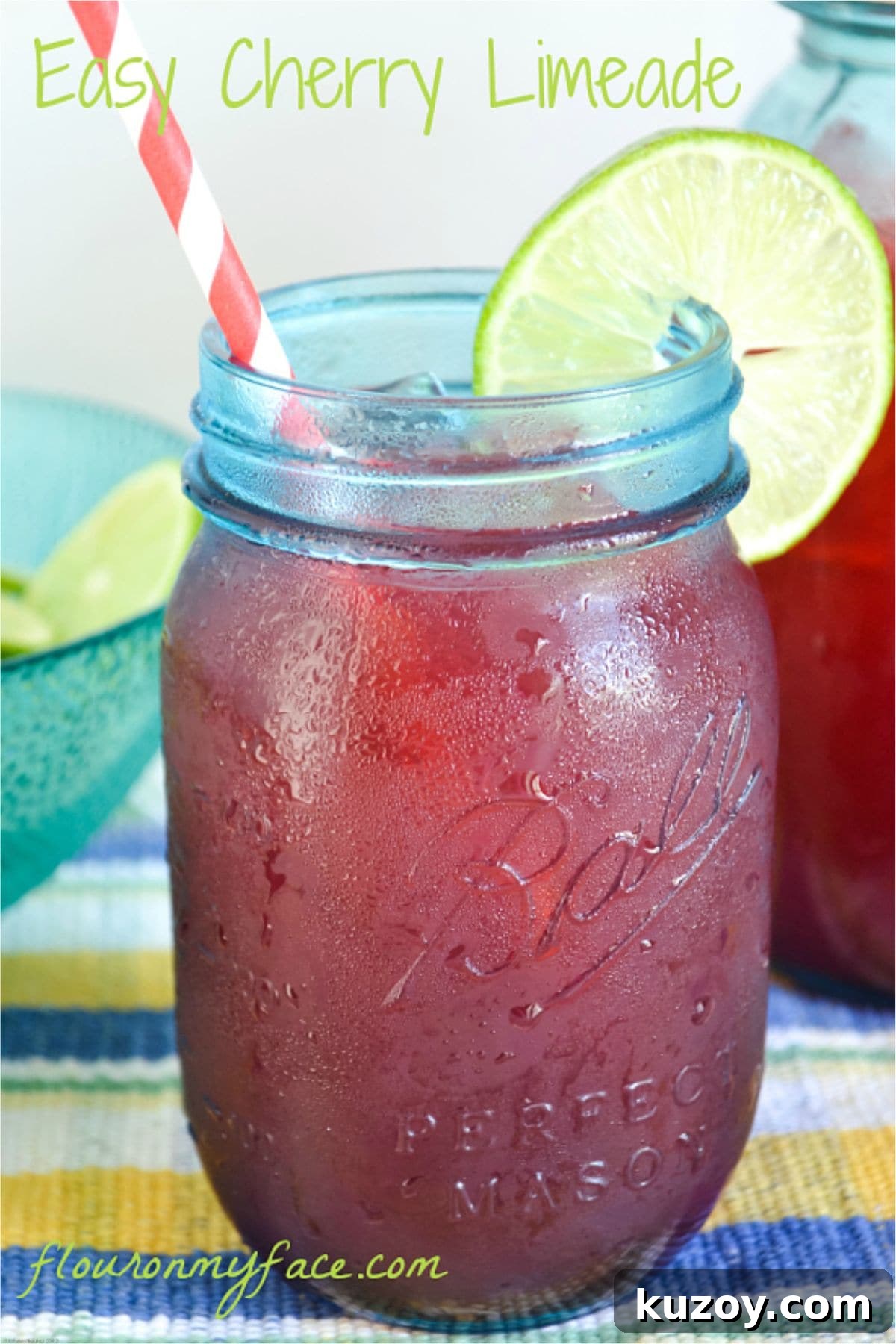 Cherry Limeade Recipe: Refreshing Homemade Drink Guide 4 A blue mason jar filled with homemade cherry limeade.