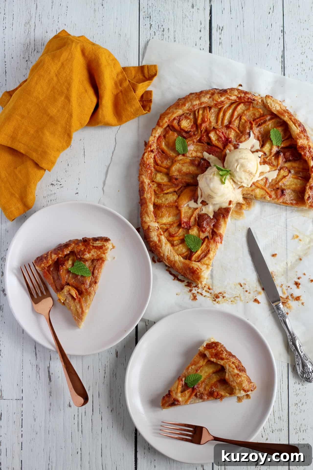 Peach Galette with Flaky Puff Pastry: Simple Summer Dessert 4 galette filled with peaches with two pieces cut out from the galette