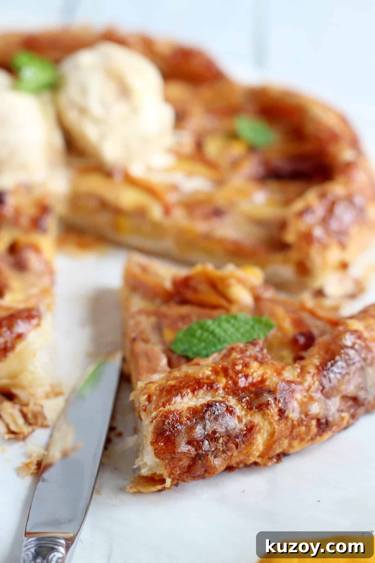 Peach Galette with Flaky Puff Pastry: Simple Summer Dessert 5 close up on puff pastry crust with peaches