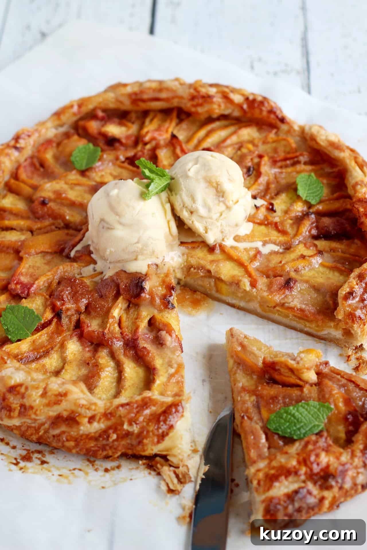 Peach Galette with Flaky Puff Pastry: Simple Summer Dessert 6 slice of peach galette taken out from the main galette