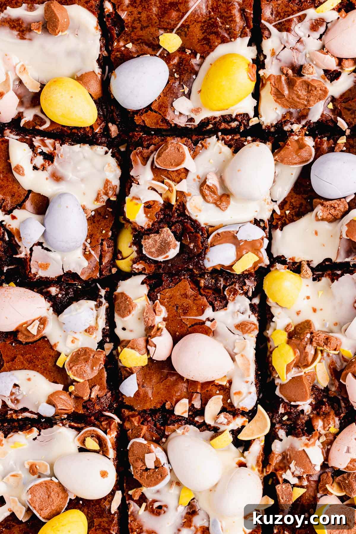 Mini Egg Brownies Recipe for Rich, Fudgy Easter Treats 13 brownies with smeared white chocolate and crushed chocolate mini eggs on top