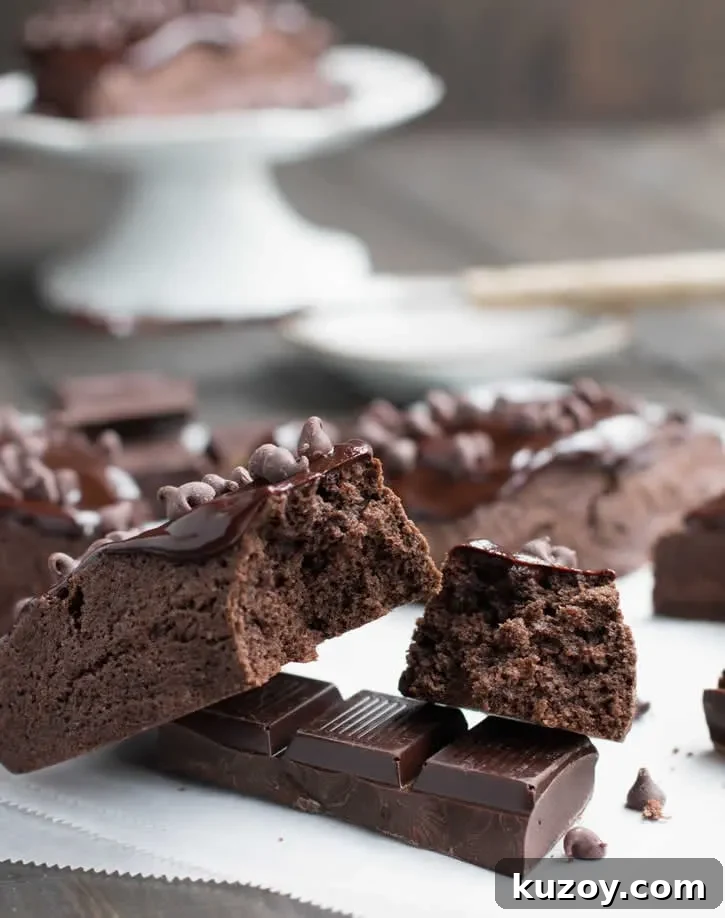Decadent Dark Chocolate Fudge Scones — Recipe & Tips 8 Dark Chocolate Fudge Scones are lightly sweetened, yet rich with dark cocoa, butter and cream, then topped with a dark fudgy ganache and mini chips.