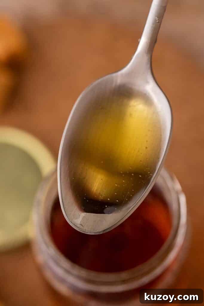Spoonful of caramel syrup for coffee