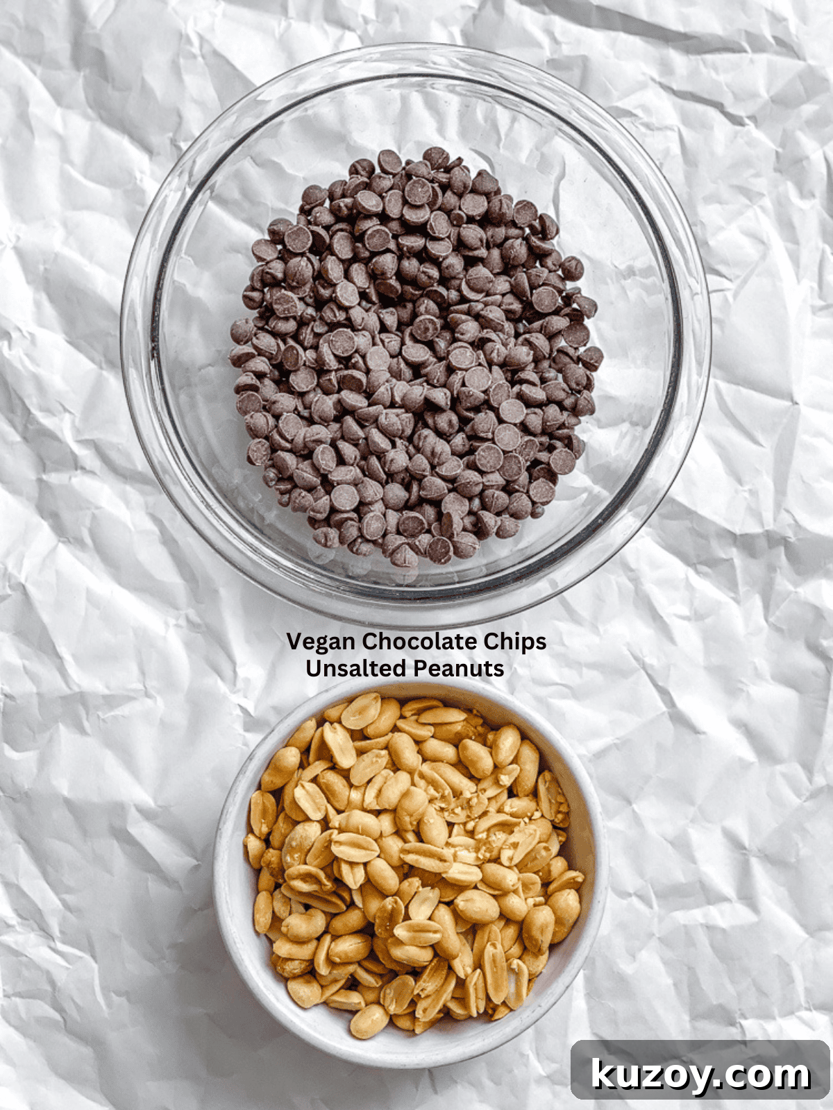 Ingredients for Peanut Clusters measured out on a white surface.
