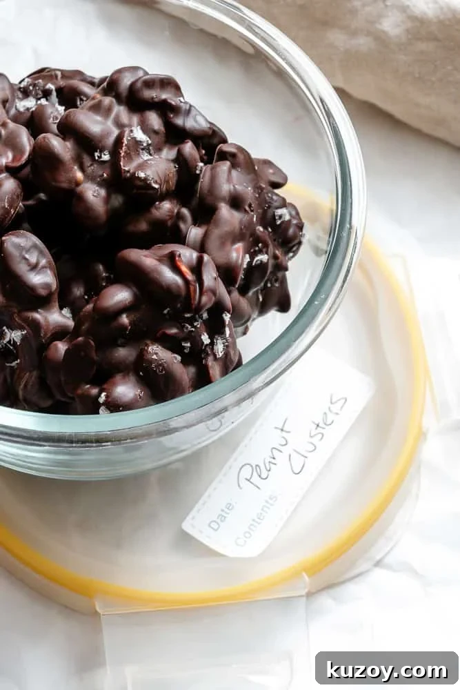 Completed Peanut Clusters in a storage container.