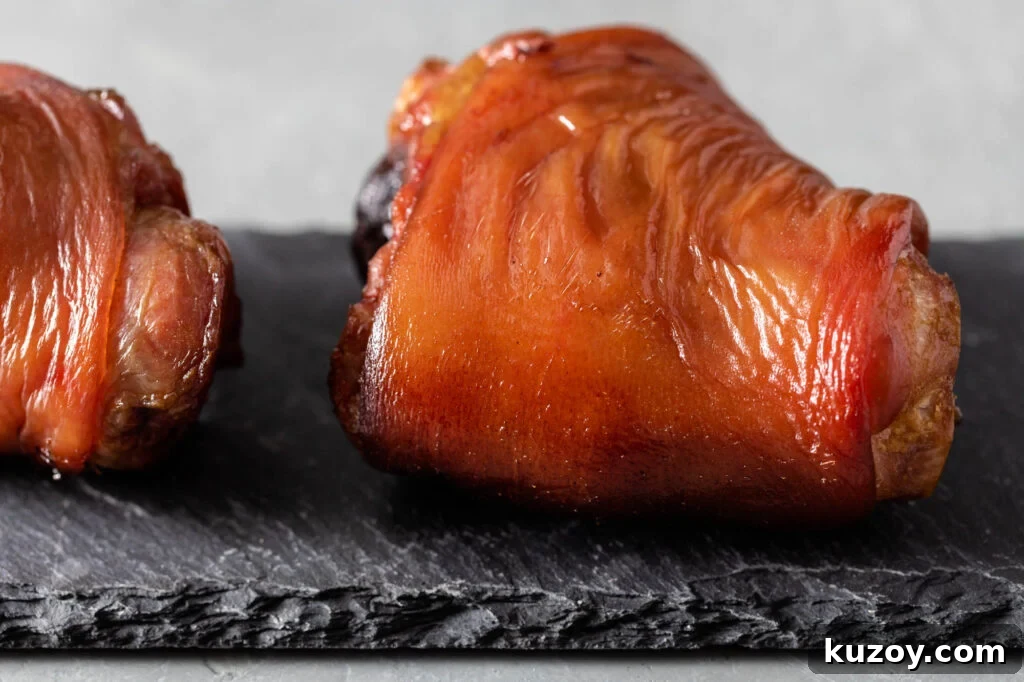 How to Cook Smoked Ham Hocks: Flavorful Recipes & Tips 2 smoked ham hocks on black plate