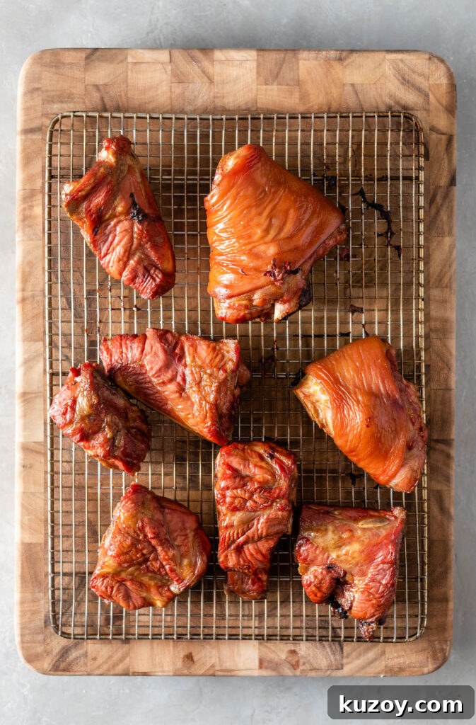 How to Cook Smoked Ham Hocks: Flavorful Recipes & Tips 7 smocked ham hocks and neck bones on a wire rack