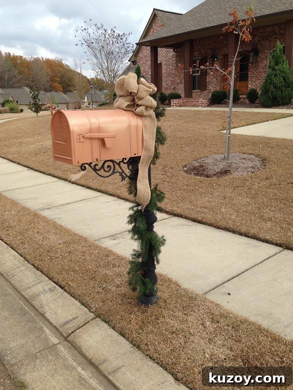 2013 Holiday Home Tour: Festive Decor Ideas & Inspiration 13 Christmas garland and burlap bow on mailbox by SeededAtTheTable.com