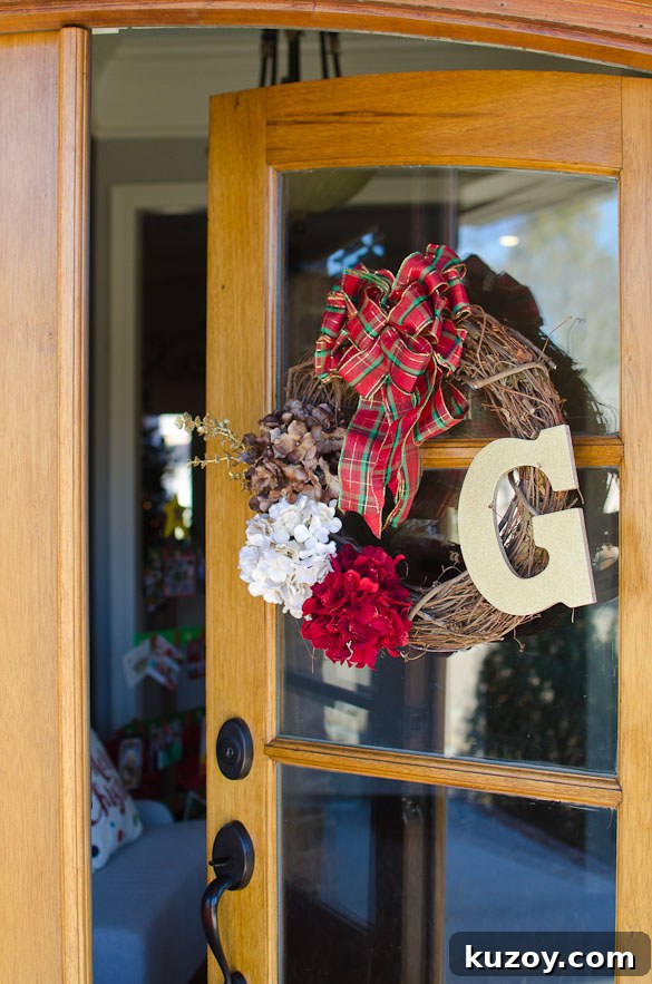 2013 Holiday Home Tour: Festive Decor Ideas & Inspiration 4 Letter G painted with gold glitter spray paint. DIY Christmas wreath for $20 by SeededAtTheTable.com