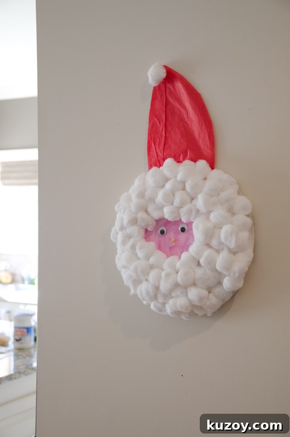2013 Holiday Home Tour: Festive Decor Ideas & Inspiration 10 Santa Craft by SeededAtTheTable.com - paper plate, glue, cotton balls