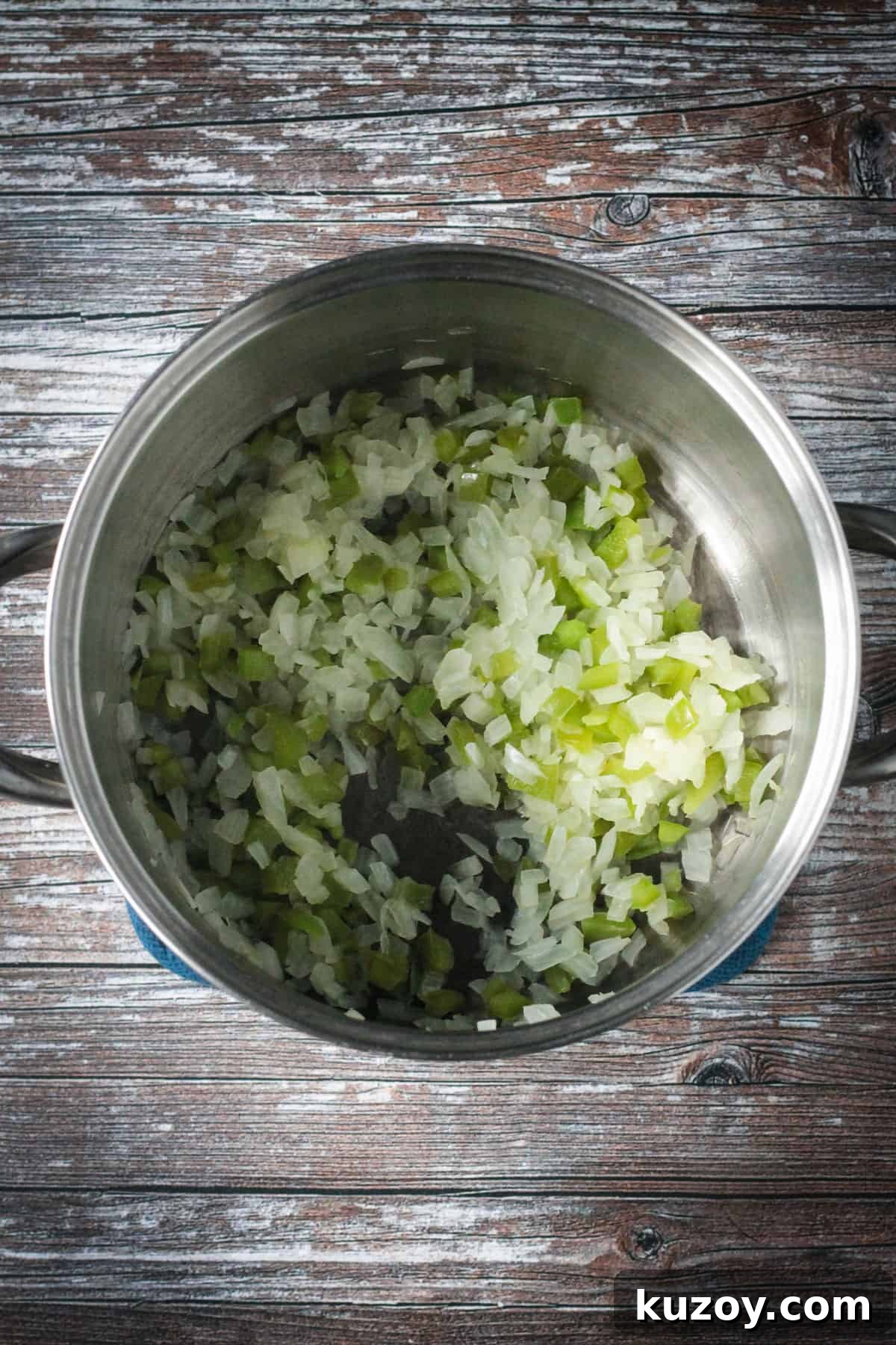 Hearty Black Bean and Quinoa Chili Recipe 2 Sautéed onions and peppers in a soup pot.