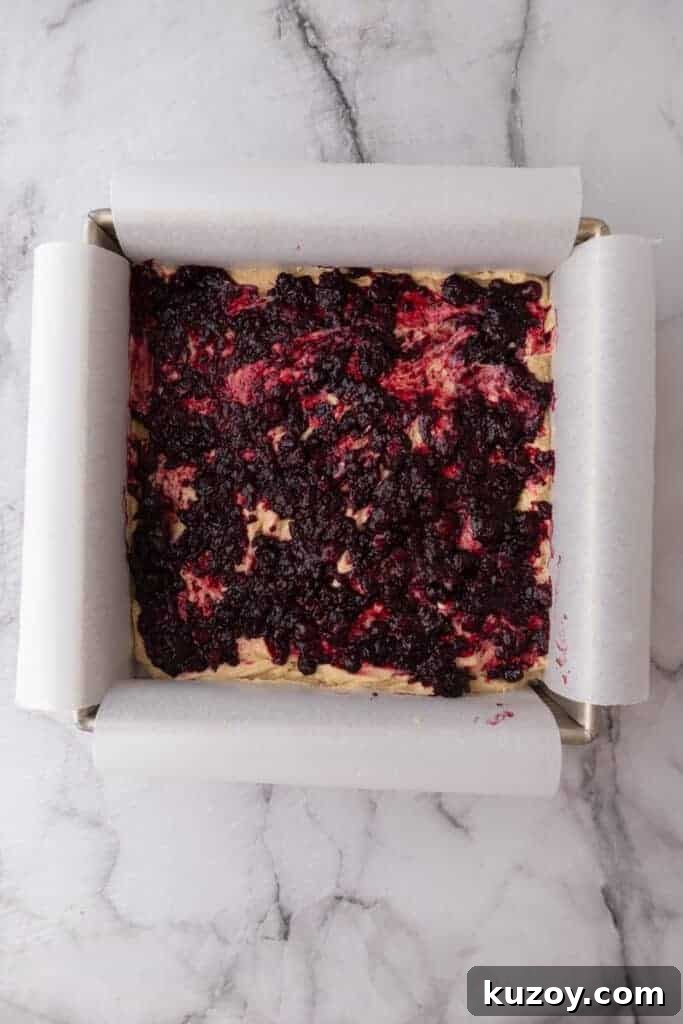 Blueberry Blondies Recipe: Moist, Chewy Bars with Fresh Berries 9 mixed ingredients in a pan