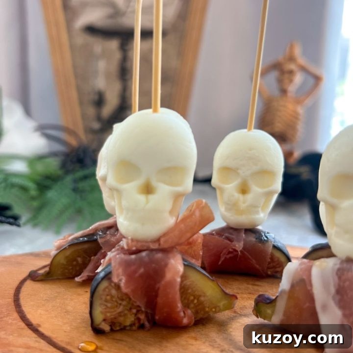 Prosciutto Wrapped Figs with Honey and Skull Cheese Skewers