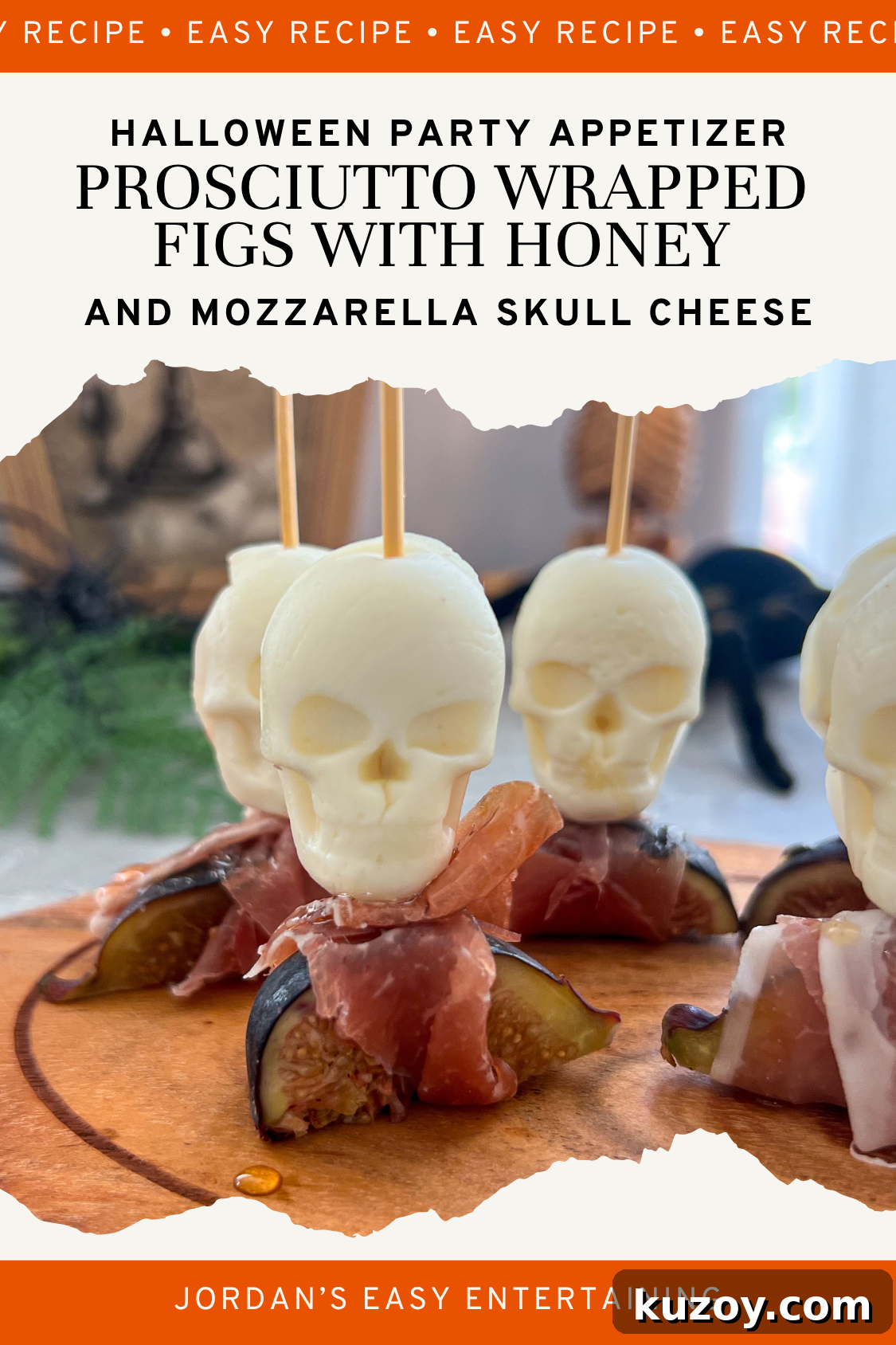 Prosciutto-Wrapped Figs with Honey and Skull Cheese Skewers 10 Close-up of Halloween appetizers featuring mozzarella skull cheese bites skewered with gold cocktail picks, wrapped in prosciutto, and paired with fresh figs on a wooden serving board.