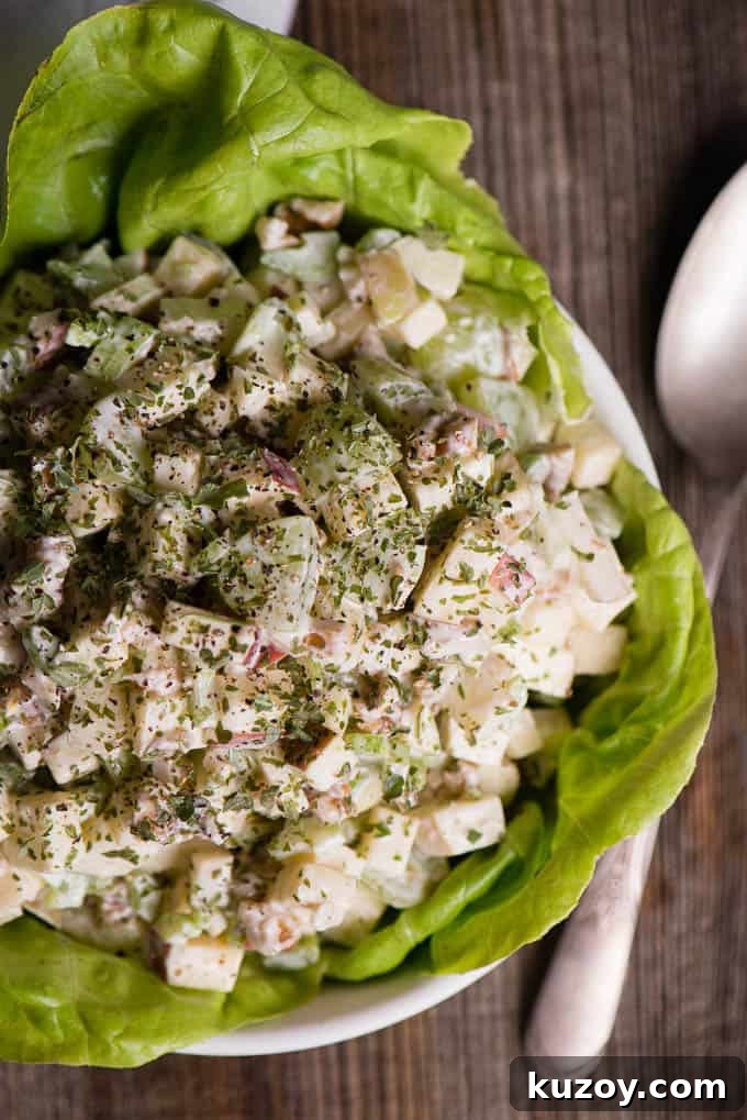 Classic Waldorf Salad Recipe with Apples, Celery & Walnuts 4 homemade waldorf salad in white bowl