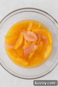 Creamy Dairy-Free Vegan Rice Pudding Recipe 10 Citrus compote in a glass bowl.