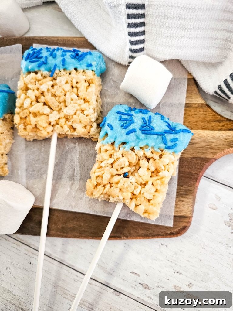 Blue Candy-Coated Rice Krispies Pops: Fun Party Treats 10 Finished blue candy coated Krispies pops