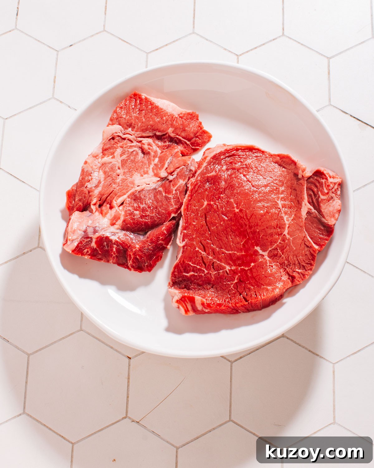 Grilled Flat Iron Steak with Creamy Peruvian Green Sauce 3 Steaks on a plate.