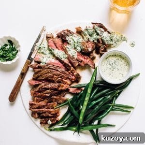Grilled Flat Iron Steak with Creamy Peruvian Green Sauce 4 Grilled Steak with green sauce and green beans on a plate.