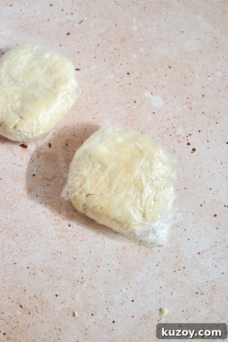 Dough wrapped in plastic wrap.