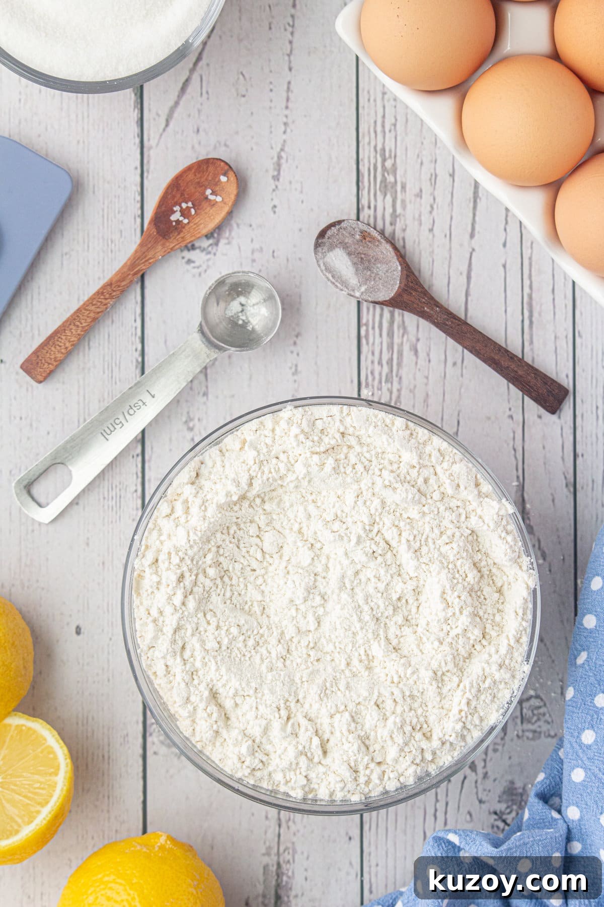 Starbucks-Style Lemon Loaf Recipe: Moist Citrus Quick Bread 5 Dry ingredients in a bowl.