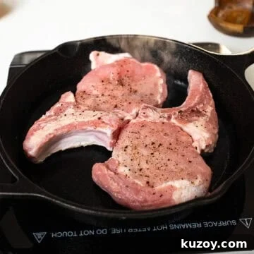 Peach Bourbon Glazed Pork Chops with Pan Sauce 8 Searing pork chops in a cast iron.