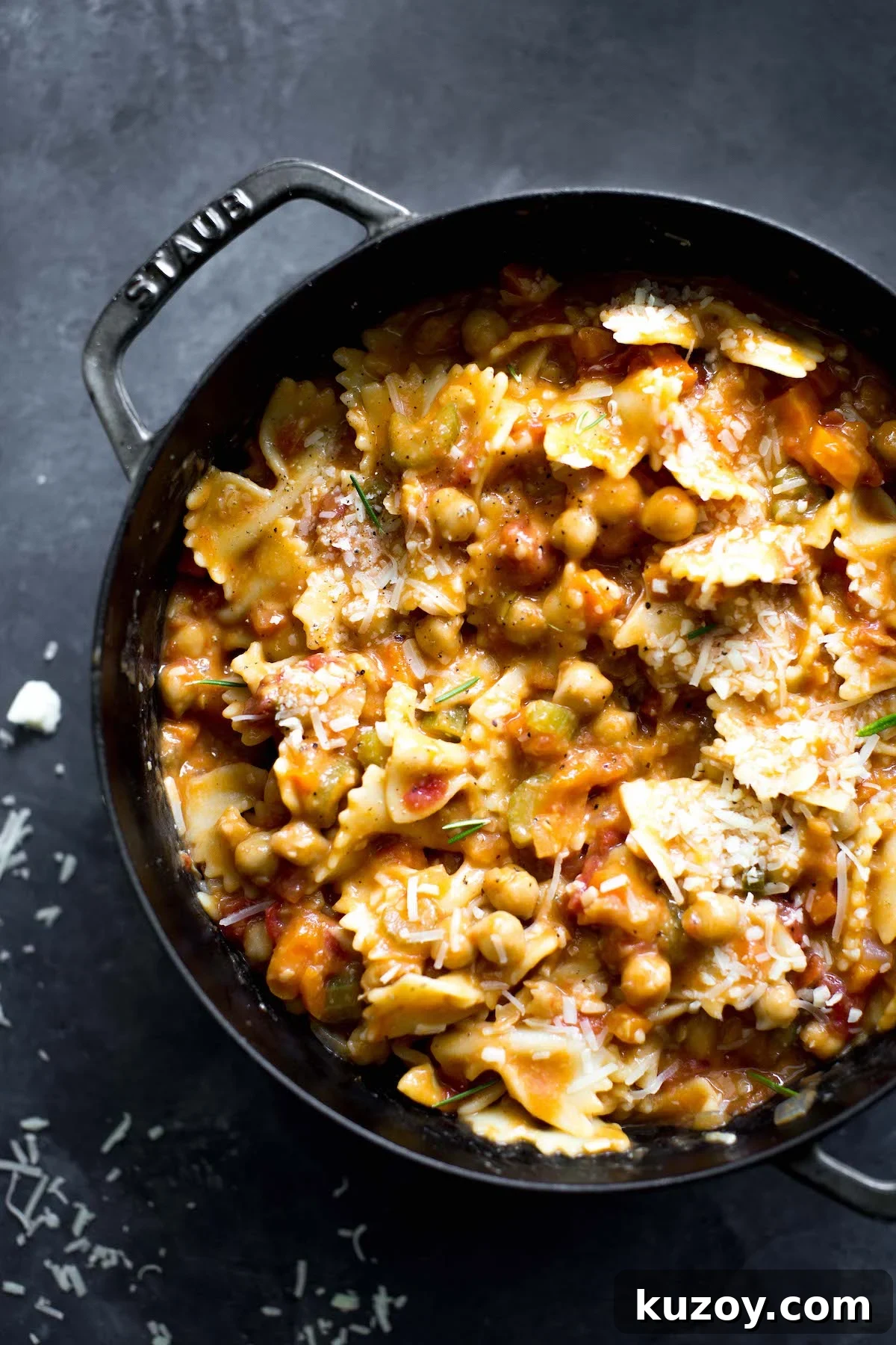One-Pot Pasta e Ceci: Hearty Italian Pasta with Chickpeas 4 overhead photo of vegetarian pasta e ceci (pasta and chickpeas) in a big pot with dark gray background