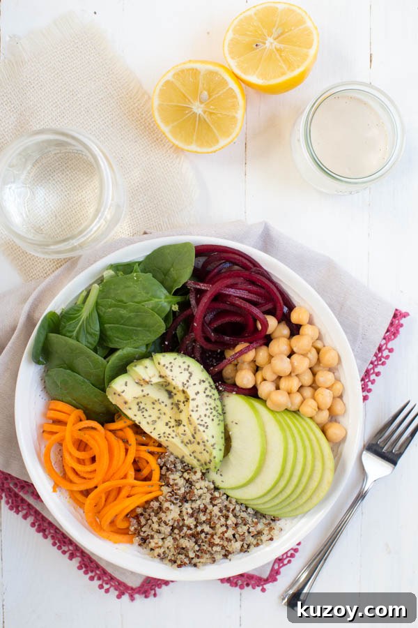 Harvest Buddha Bowl with Lemon Tahini Dressing - spiralized beet and sweet potato noodles with apple, chickpeas and spinach
