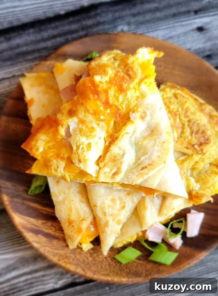 Sliced breakfast quesadilla served on a plate