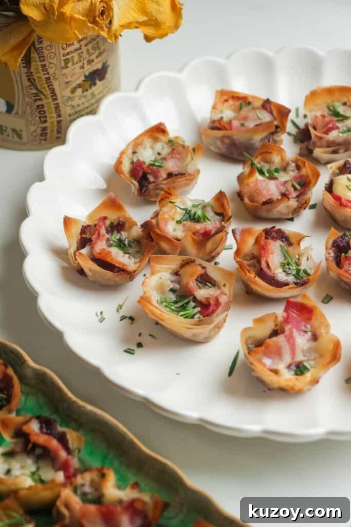 Filo bites on a large scalloped plate.