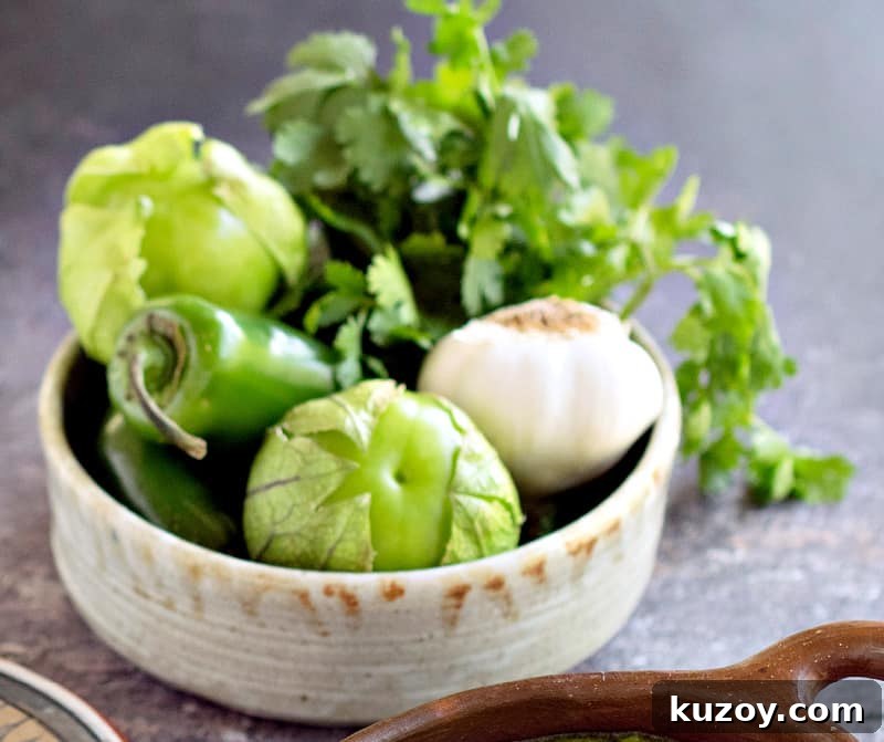 tomatillos, onion, garlic in bowl