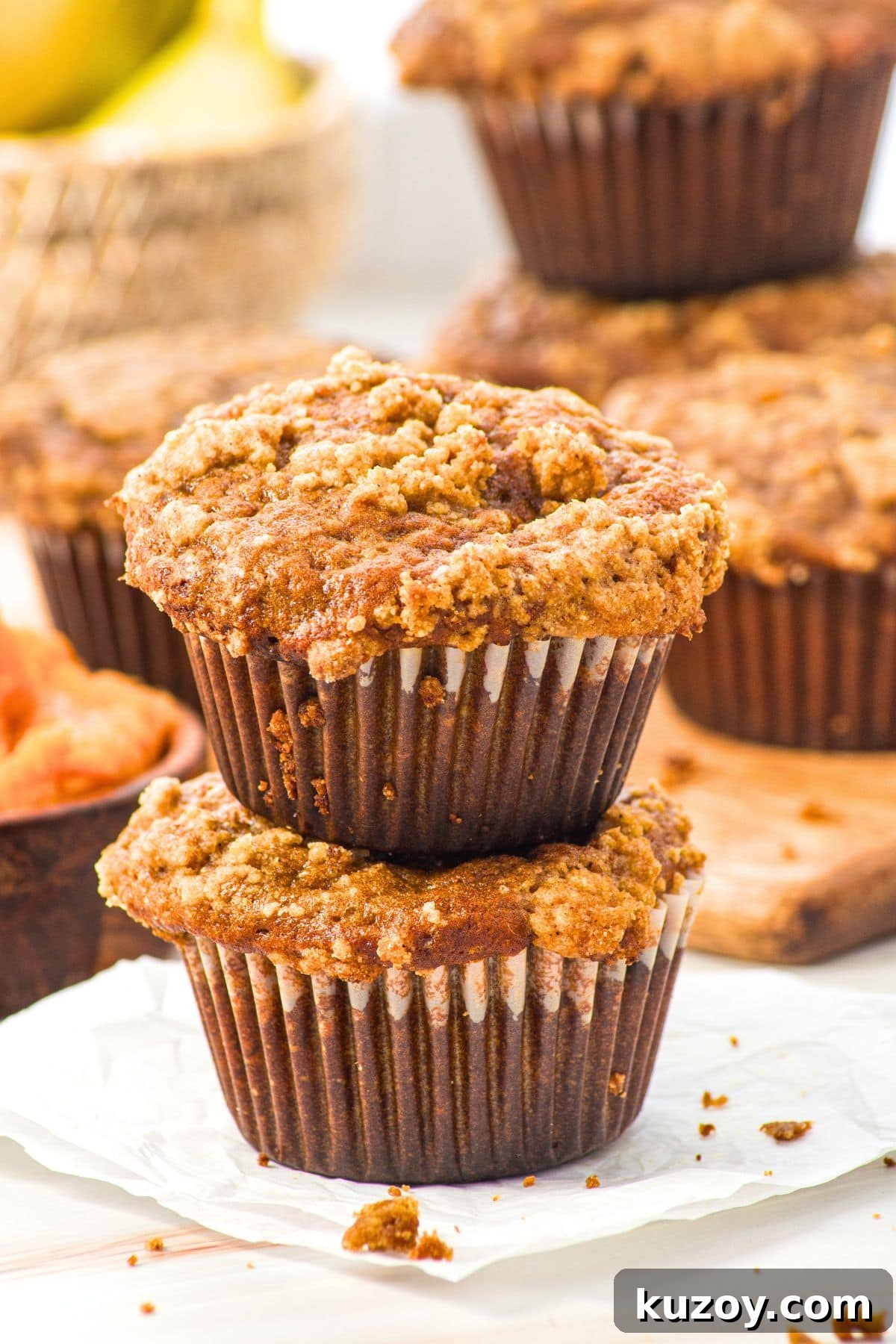 A stack of gluten-free pumpkin banana muffins