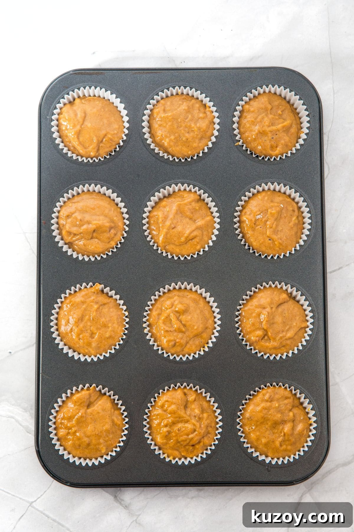 Pumpkin batter in muffin pan