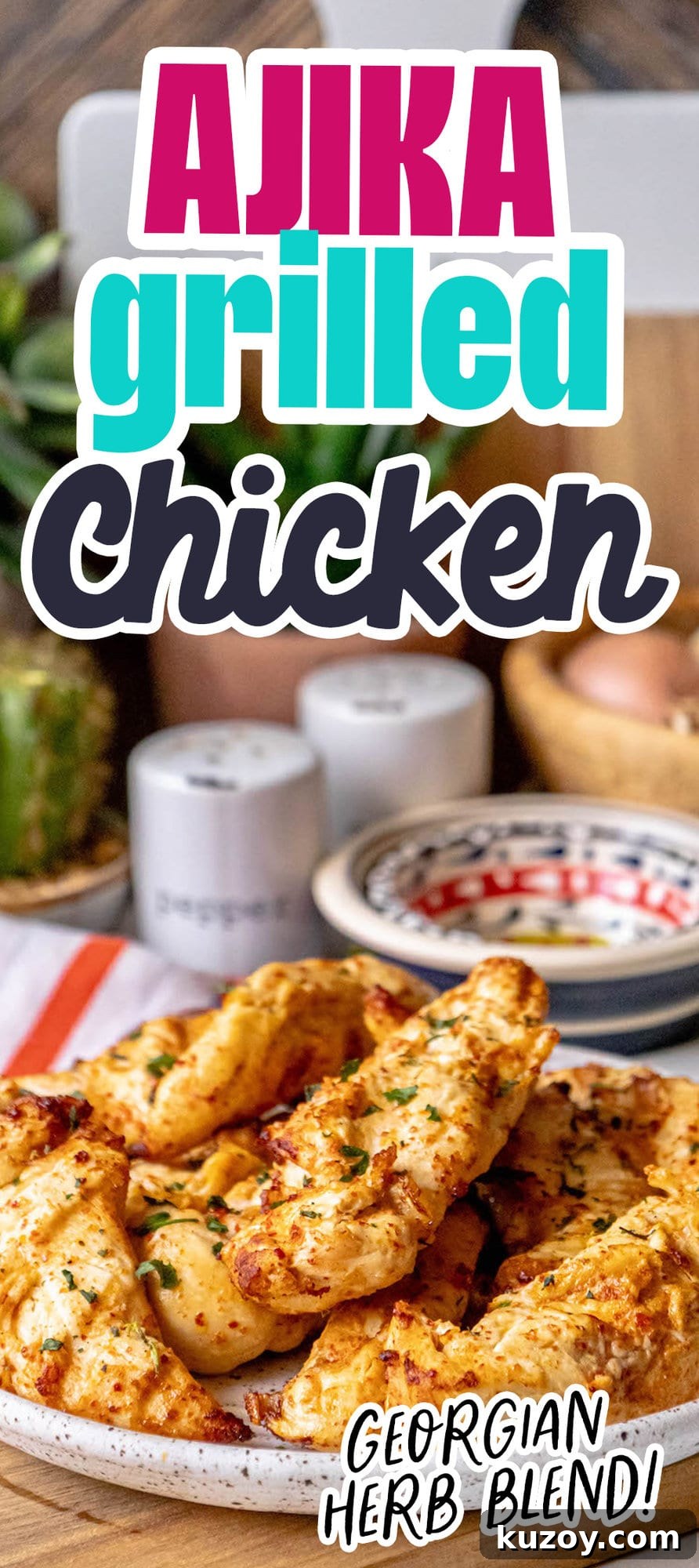 grilled chicken tenders on a white plate with Georgian Ajika seasoning with chopped cilantro on top